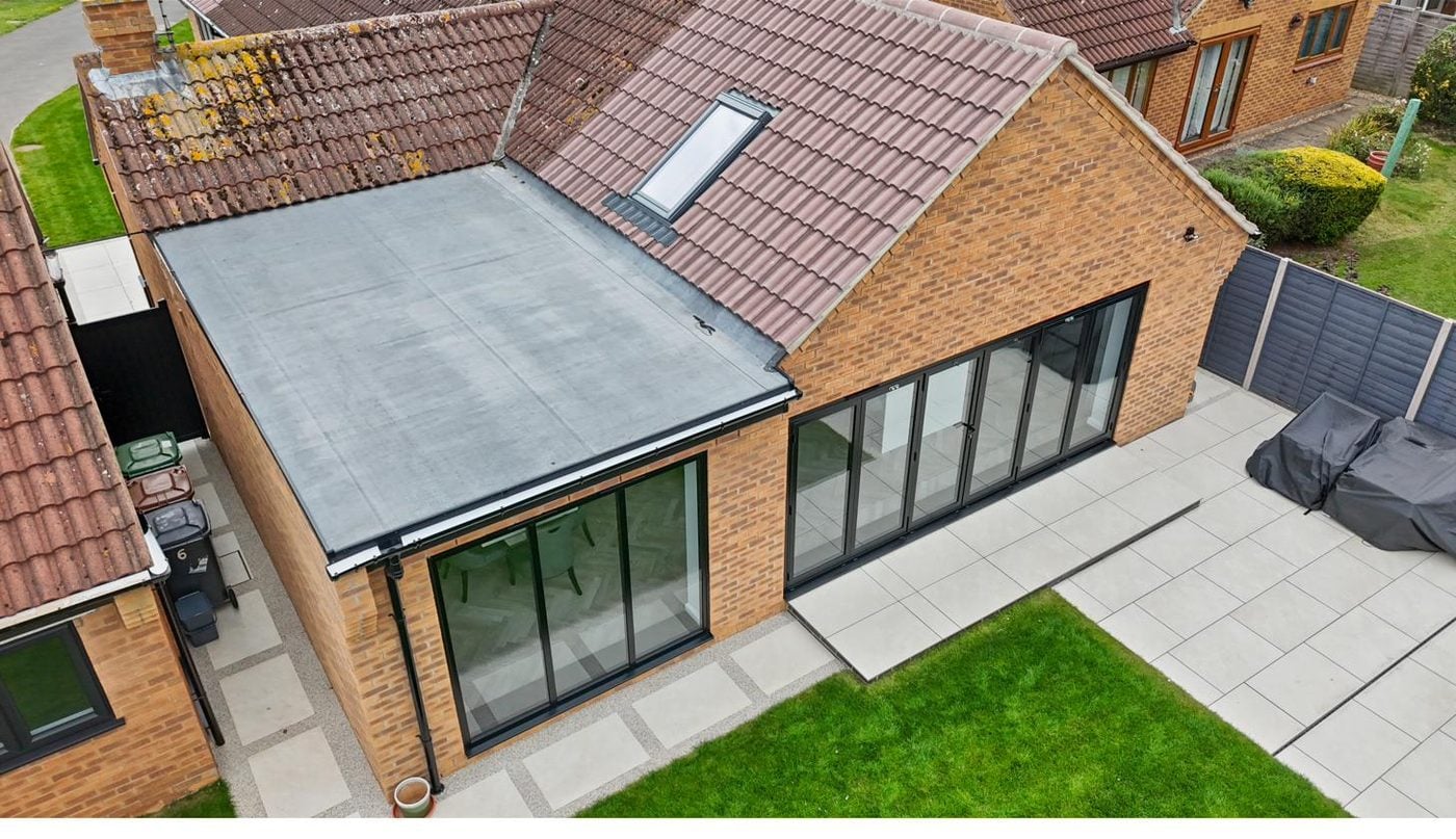 Aerial of a Huntingdon bungalow extension with bifold doors and a sliding patio set