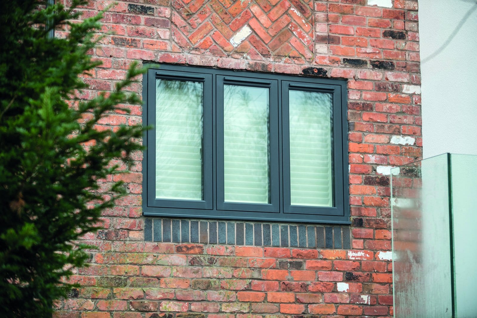 Residence Collection R² anthracite flush uPVC windows installed on a Peterborough period brick property