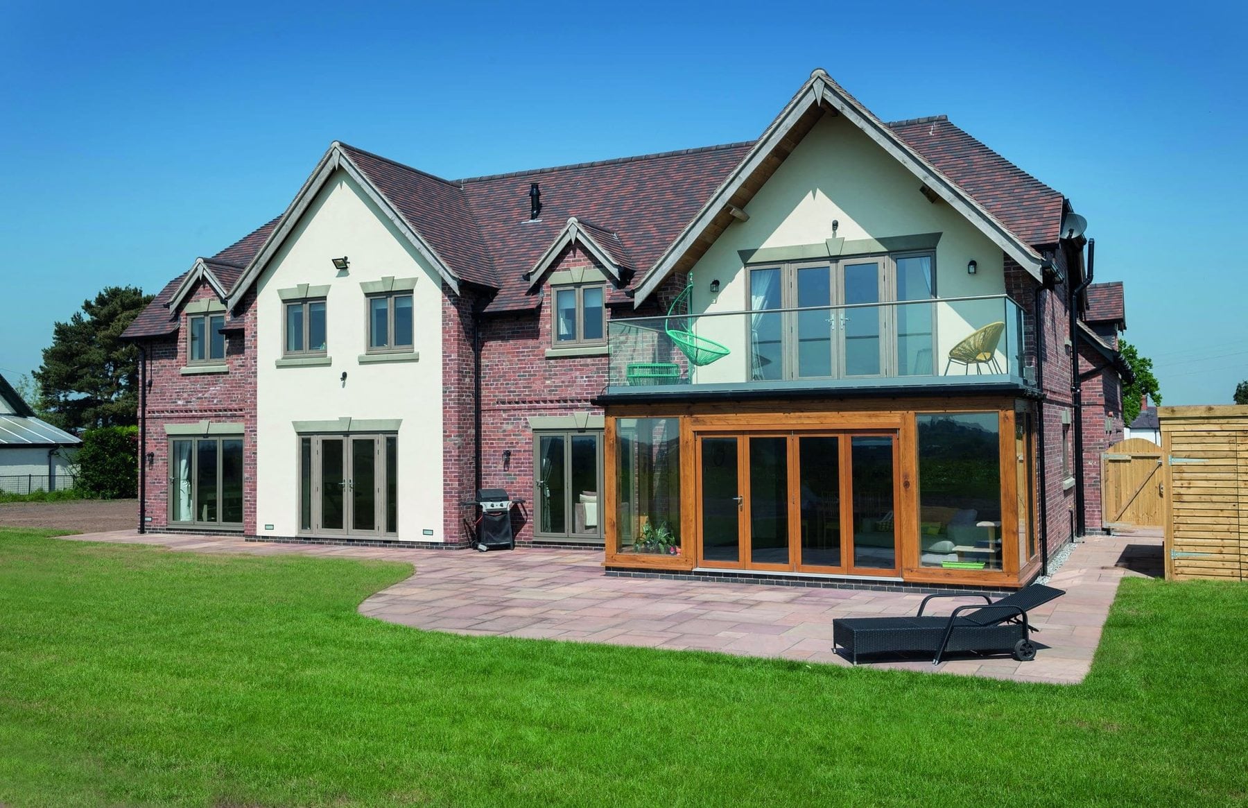 Full property showcasing Residence Collection R² flush uPVC windows installed across the home