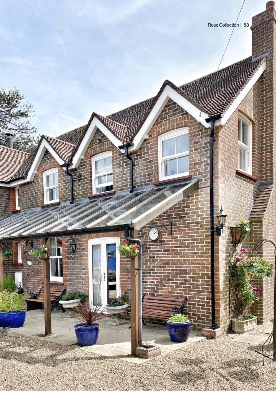 Charisma Rose sash windows on a brick gabled country home