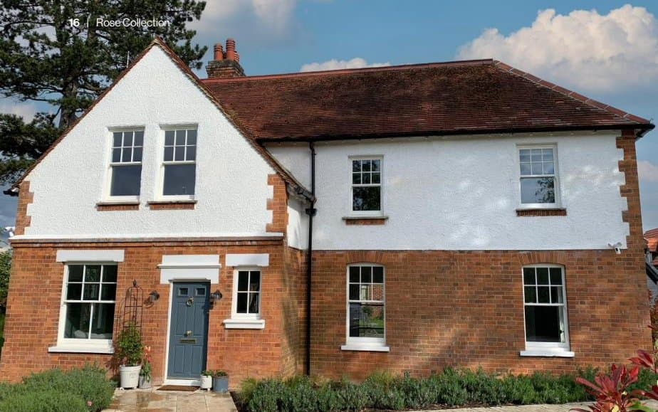 Heritage Rose sash windows on a white period property