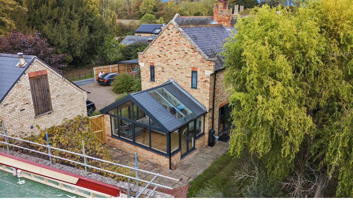 Aerial view of a glazed conservatory extension on a Cambridgeshire cottage by Custom Choice