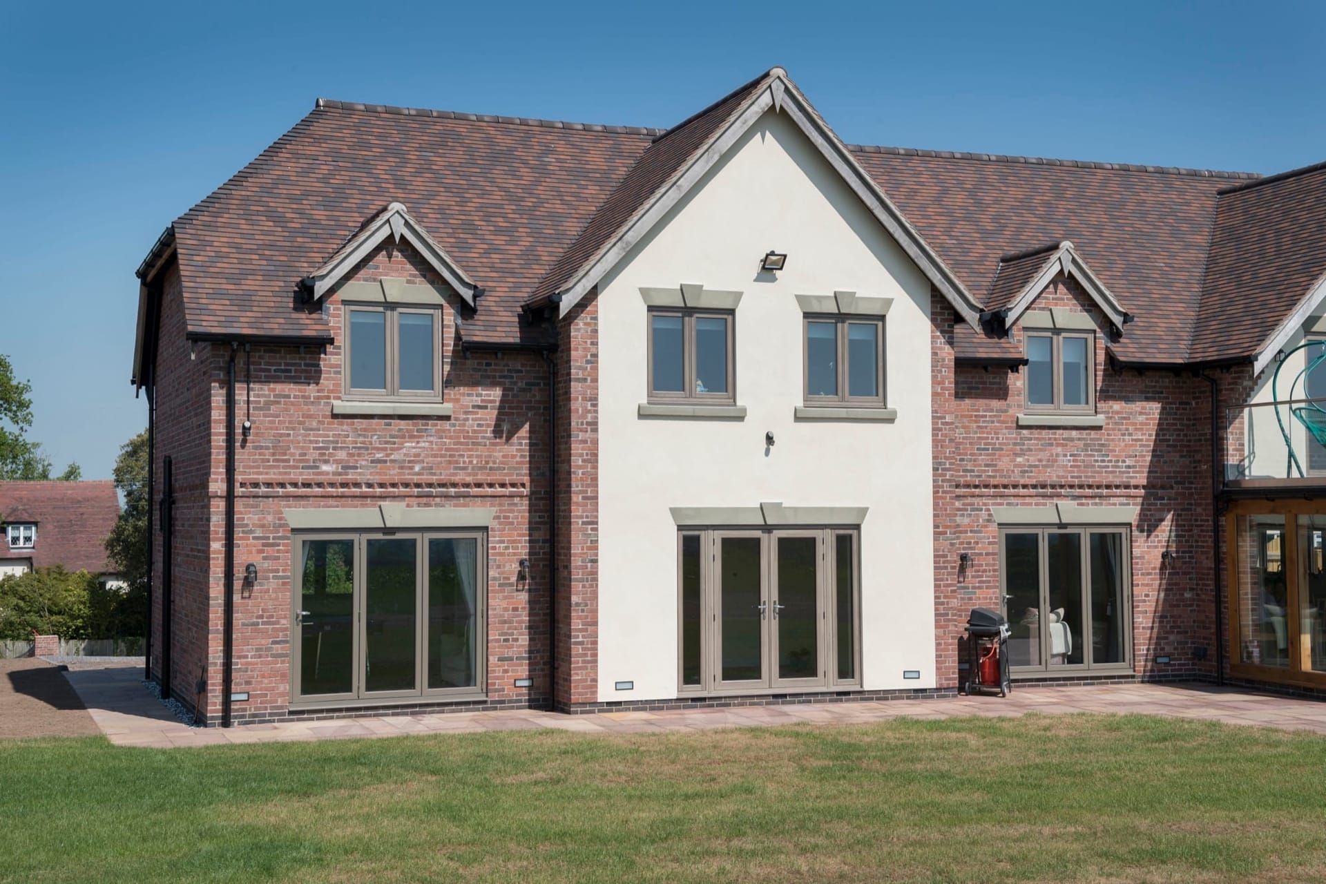 Slim-framed aluminium windows in the Crittal style on a modern Peterborough home