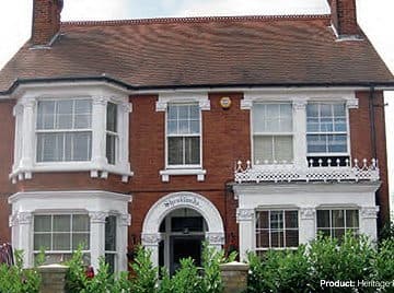 Heritage sash windows on a red brick Victorian villa