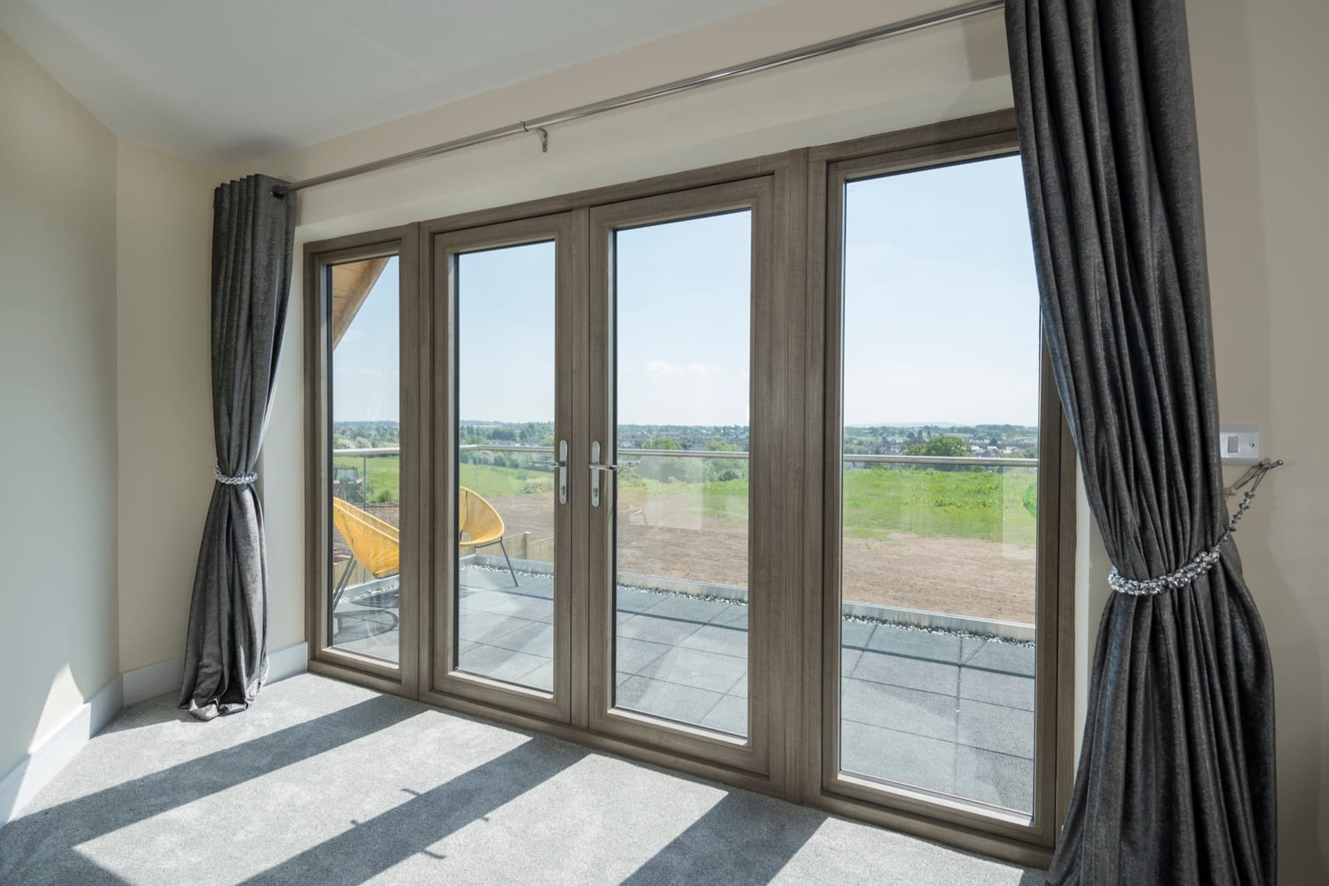 Aluminium sliding doors with slim sightlines and a panoramic view from inside