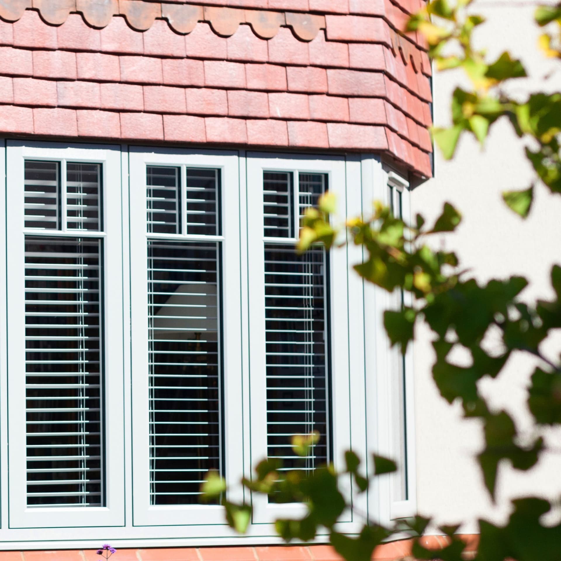 White flush sash uPVC bay window on a period property